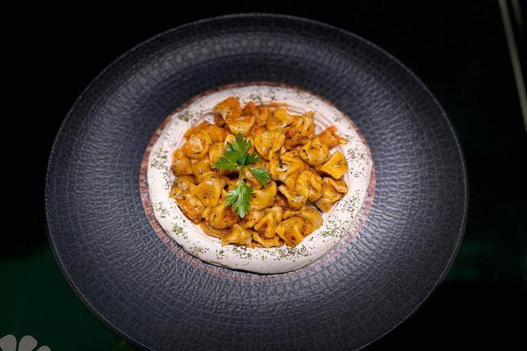 Kayseri mantı with yogurt and spiced butter sauce