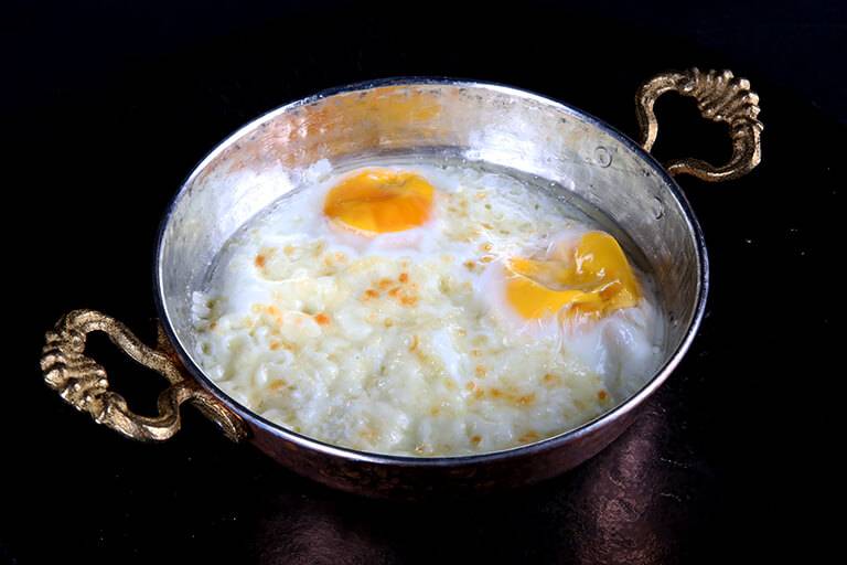 Double-yolk pan-fried eggs with kashar cheese