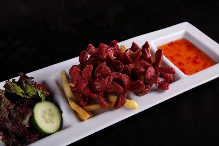 Sausage plate with French fries