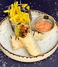 Meatball wrap with dip sauce and fries