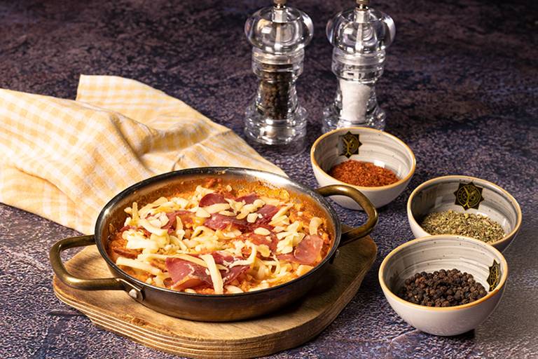 Menemen with pastırma and kaşar cheese