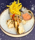 Chicken wrap with dip sauce and French fries