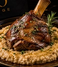 Lamb shank with keşkek