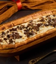 Pide with kavurma and kaşar cheese