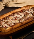 Turkish pide with diced beef and kaşar cheese