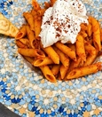 Penne Bolognese with strained yogurt