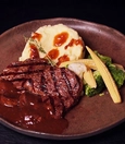 Beef Tenderloin Medallions with Bruschetta Bread, Buttered Vegetables and Mushroom Demi-Glace Sauce