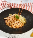 Fettuccine Alfredo with chicken breast, Parmesan and creamy mushroom sauce