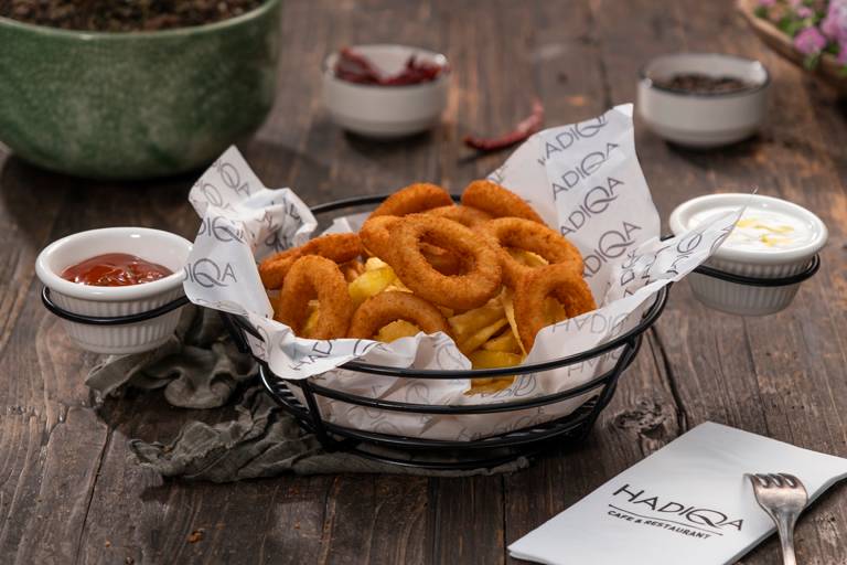 Onion rings with fries and special sauces