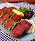Grilled ribeye steak and sucuk